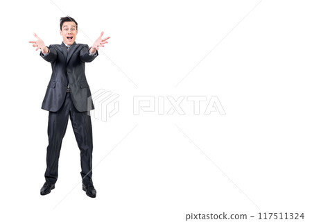 Amazed man celebrating success in studio. White background. Amazed man celebrating success in studio. White background. 117511324