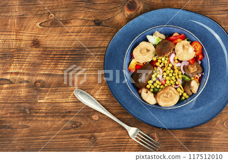 Vegetable salad with pickled mushrooms. 117512010