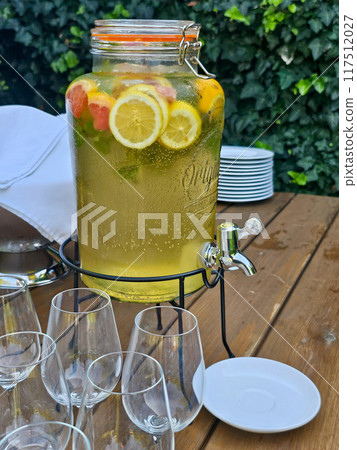 Fresh lemonade in a jar outdoors, Modra, Slovakia Fresh lemonade in a jar outdoors, Modra, Slovakia 117512027