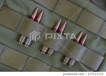 Assault Rifle Bullets Are Pairwise Stuffed Under Belts Of Tactical Pouch Assault Rifle Bullets Are Pairwise Stuffed Under Belts Of Tactical Pouch 117513152
