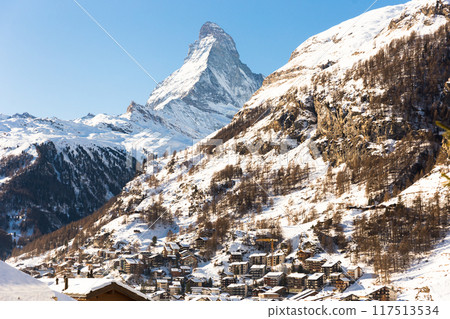 Snowy mountain Matterhorn during the day in winter. Zermatt, swiss alps 117513534