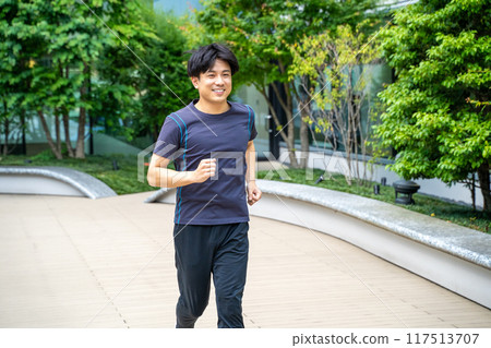 Men running in the park Men running in the park 117513707
