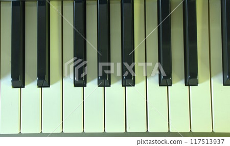 piano keyboard in house with shadow background and texture piano keyboard in house with shadow background and texture 117513937