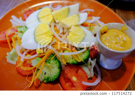 Vegetable salad with boiled eggs and mayonnaise sauce Vegetable salad with boiled eggs and mayonnaise sauce 117514272