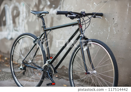 A stylish vintage bicycle with a copper-colored frame and black tires Generative AI 117514442
