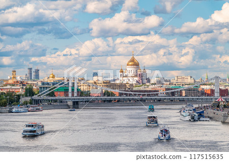 Cruise ship sails on the Moscow river in Moscow city center, popular place for walking. Cruise ship sails on the Moscow river in Moscow city center, popular place for walking. 117515635