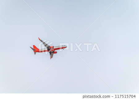 Airplane before landing in blue sky, Boeing 737-800 Airplane before landing in blue sky, Boeing 737-800 117515704