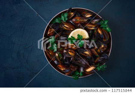 Fresh, Boiled mussels, Black Sea, with parsley and lemon, no people, top view Fresh, Boiled mussels, Black Sea, with parsley and lemon, no people, top view 117515844