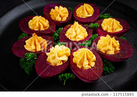 stuffed eggs, stained with beetroot juice, purple, pitaya powder, top view, top view, close-up, no people, 117515893