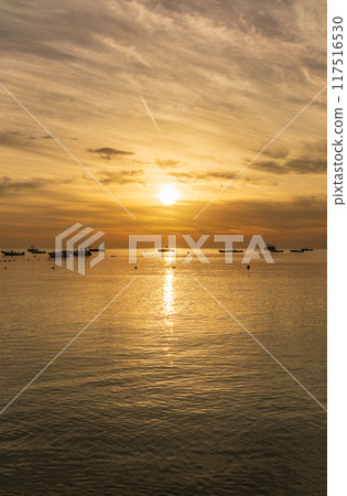 Beautiful red and orange sunrise over the sea. 117516530