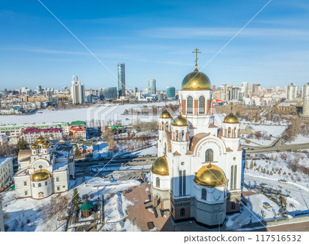 Winter Yekaterinburg and Temple on Blood in beautiful cloudy sunset. Aerial view of Yekaterinburg, Russia. Translation of the text on the temple 117516532