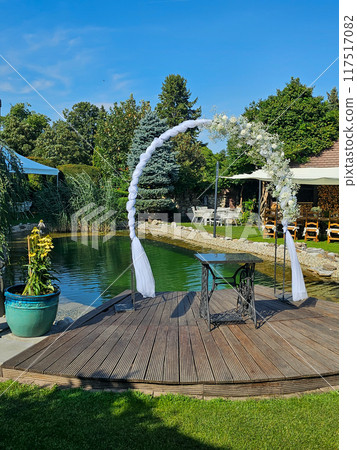 Festive arch for wedding in the garden, Modra, Slovakia Festive arch for wedding in the garden, Modra, Slovakia 117517082