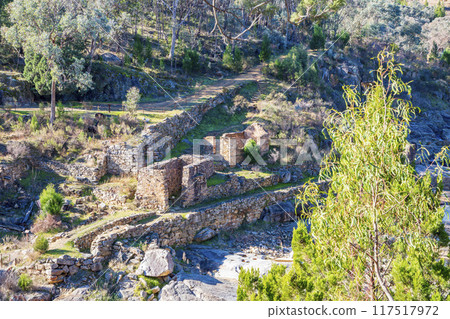 The old gold mine brick and stone processing buildings near Adelong Creek 117517972