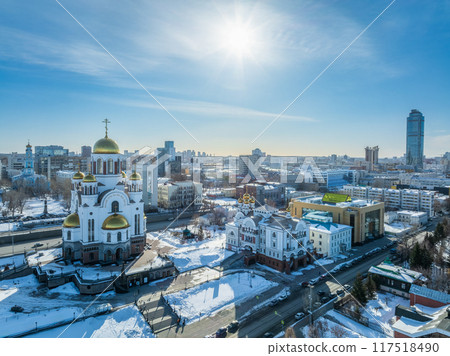 Winter Yekaterinburg and Temple on Blood in beautiful cloudy sunset. Aerial view of Yekaterinburg, Russia. Translation of the text on the temple 117518490