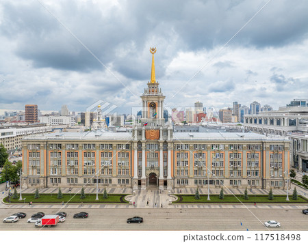 Yekaterinburg City Administration or City Hall and Central square at summer evening. Evening city in the summer sunset, Aerial View. Yekaterinburg City Administration or City Hall and Central square at summer evening. Evening city in the summer sunset, Aerial View. 117518498
