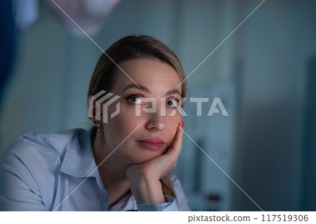 Portrait of beautiful woman, resting head on hand. Portrait of beautiful woman, resting head on hand. 117519306
