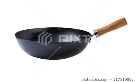 Empty chinese wok pan isolated on a white background. Empty frying wok pan chinese cookware. 117519892