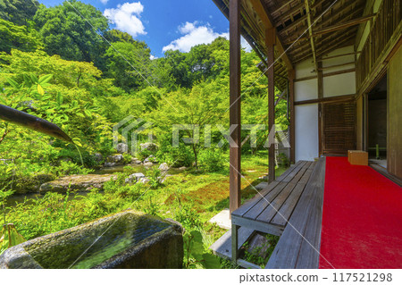 Summer in Iwakura, Kyoto: Jisso-in Temple, a landscape garden surrounded by green foliage Summer in Iwakura, Kyoto: Jisso-in Temple, a landscape garden surrounded by green foliage 117521298