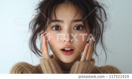 A woman with a surprised expression 117521919