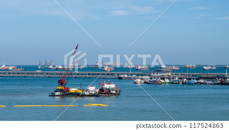 Logistic shipping quay boat Engineering crane depot at logistic export terminal control. Warehouse freight background container yard loading quayside harbor port. Logistics seascape shipping portal Logistic shipping quay boat Engineering crane depot at logistic export terminal control. Warehouse freight background container yard loading quayside harbor port. Logistics seascape shipping portal 117524863
