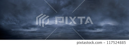 Banner Dramatic dark storm clouds black sky background. Dark thunderstorm clouds rainny season. Panorama Meteorology danger windstorm disasters climate. Dark cloudscape storm cloud with copy space. Banner Dramatic dark storm clouds black sky background. Dark thunderstorm clouds rainny season. Panorama Meteorology danger windstorm disasters climate. Dark cloudscape storm cloud with copy space. 117524885