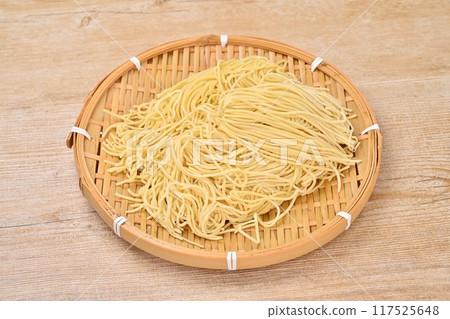 Ingredients, raw Chinese noodles, thin noodles, raw noodles. Thin Chinese noodles. Ingredients, raw Chinese noodles, thin noodles, raw noodles. Thin Chinese noodles. 117525648