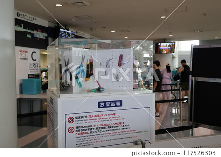 Fukuoka Airport International Terminal, in front of security checkpoint, abandoned goods box 117526303