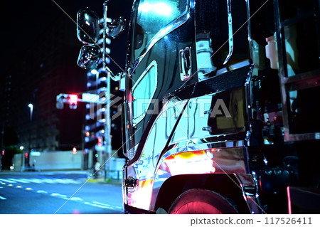 Side view of a truck at night 117526411