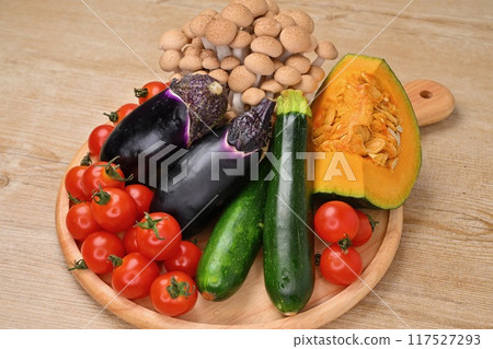 Colorful vegetable food images. Eggplant, zucchini, pumpkin, cherry tomato, shimeji mushroom. 117527293