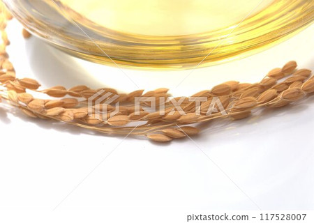 Rice oil in a glass container Rice oil in a glass container 117528007