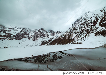 Frozen Lake Morskie Oko or Sea Eye Lake in Poland at Winter. 117528790