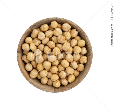 wooden bowl of hazelnuts isolated on white background 117529526