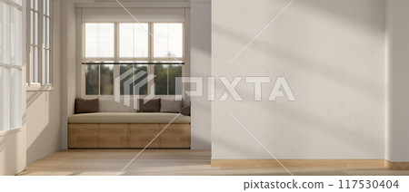 A cozy contemporary home corridor or hallway features a sofa against the window, a white empty wall. 117530404