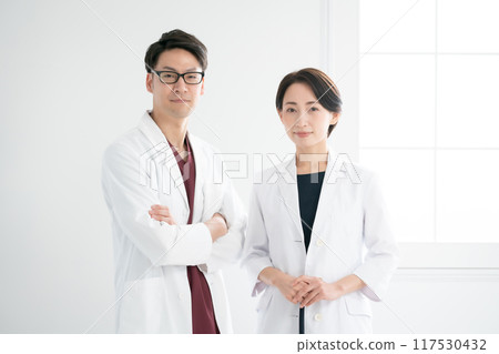 White coat medical research men and women White coat medical research men and women 117530432
