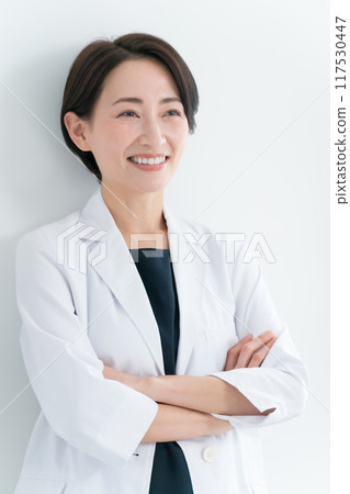 A lady in white 117530447