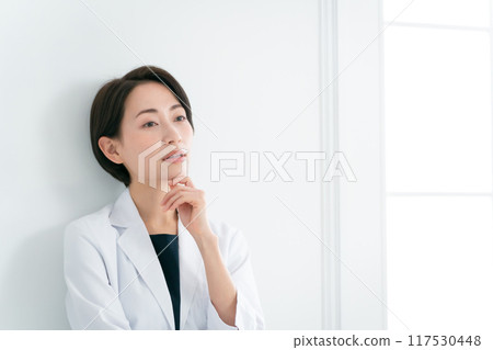 A lady in white A lady in white 117530448