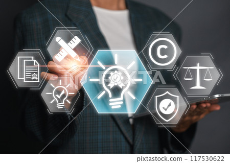 Visual representation of intellectual property concepts including copyright, patent, and legal protection with modern digital interface icons. 117530622