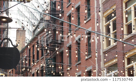 New York City Manhattan building architecture. Red brick house exterior. Real estate property, USA. 117530740