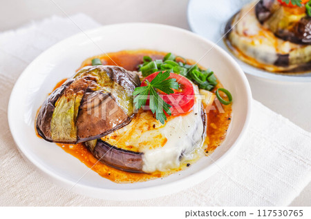 Kamo eggplant baked in butter and soy sauce with cheese Kamo eggplant baked in butter and soy sauce with cheese 117530765