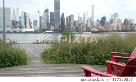 New York City waterfront skyline, Manhattan Midtown riverfront skyscrapers. Cityscape from Queens. 117530837