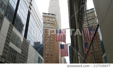New York, american flag. Empire State building. Manhattan midtown city street banner, patriotism. New York, american flag. Empire State building. Manhattan midtown city street banner, patriotism. 117530877