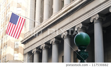 New York Manhattan Downtown Financial District. American USA flag on Wall street near Stock Exchange New York Manhattan Downtown Financial District. American USA flag on Wall street near Stock Exchange 117530882