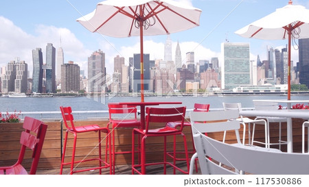 New York City waterfront skyline, Manhattan Midtown riverfront skyscrapers. Cityscape from Queens. New York City waterfront skyline, Manhattan Midtown riverfront skyscrapers. Cityscape from Queens. 117530886