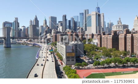 Brooklyn Bridge from Manhattan Bridge. New York City downtown skyline, financial district cityscape. 117530901