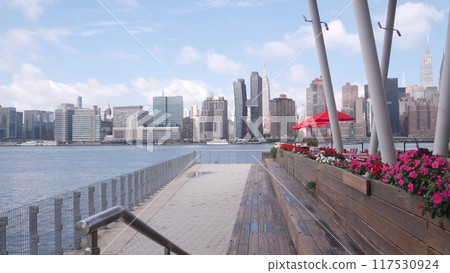 New York City waterfront skyline, Manhattan Midtown riverfront skyscrapers. Cityscape from Queens. 117530924