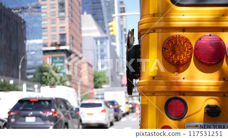 Yellow School Bus on New York Manhattan street, schoolbus truck on USA city road. Children education Yellow School Bus on New York Manhattan street, schoolbus truck on USA city road. Children education 117531251