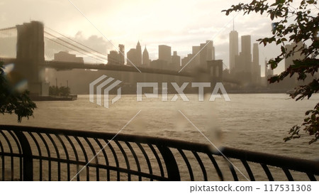 Brooklyn Bridge, Dumbo, rainy foggy day. New York City Manhattan downtown skyline. World Trade Center 117531308