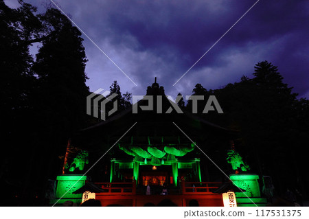 Nagano: The majestic Suwa Taisha Shimosha Akimiya illuminated by lights on a summer night Nagano: The majestic Suwa Taisha Shimosha Akimiya illuminated by lights on a summer night 117531375