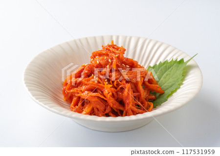 Squid kimchi on a white background Squid kimchi on a white background 117531959