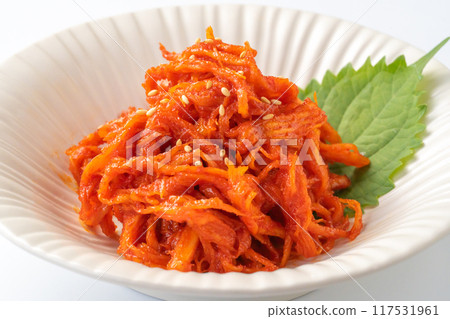 Squid kimchi on a white background Squid kimchi on a white background 117531961